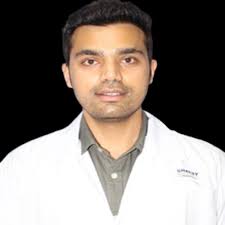 Dr Adam Teja